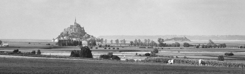 A photograph of Mont St. Michel in France by William Clift. At the top of this post is a photograph of Shiprock in New Mexico by Clift. 